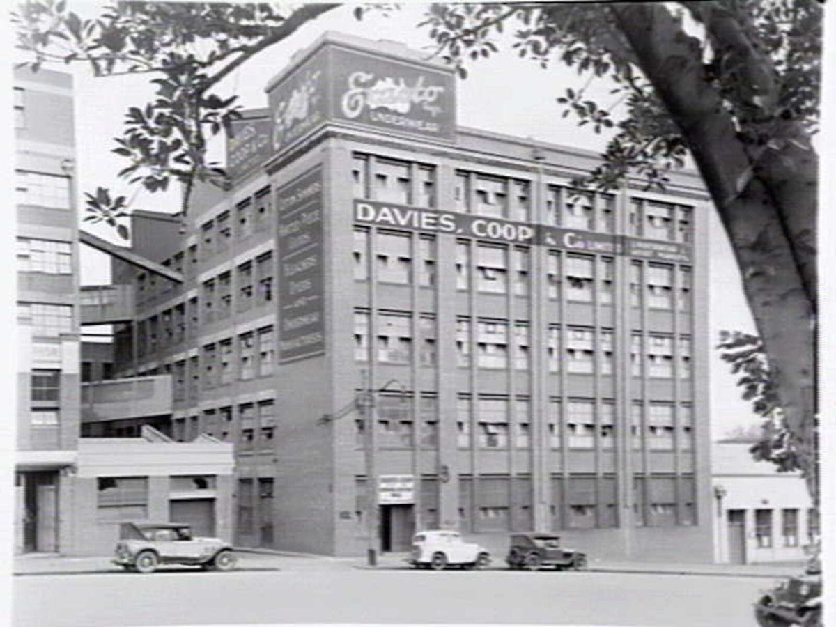 Exterior of Davies, Coop & Co., underwear manufacturers of Exacto brand, 19-31 Lincoln Square South, Carlton. Taken from Lincoln Square Gardens (1948)