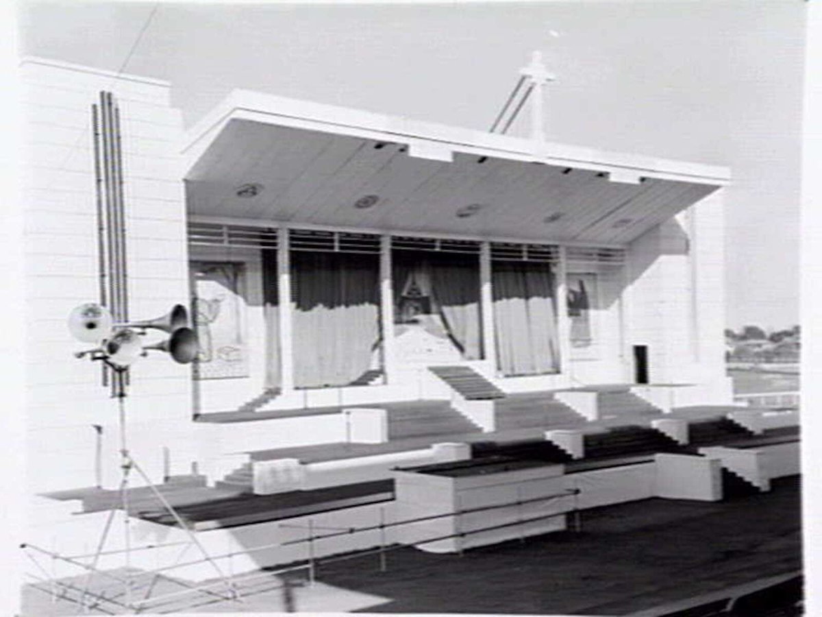Outdoor stage set up for performance of a passion play to celebrate the centenery of the Melbourne Catholic Diocese, probably at Caulfield Race Course (1948)