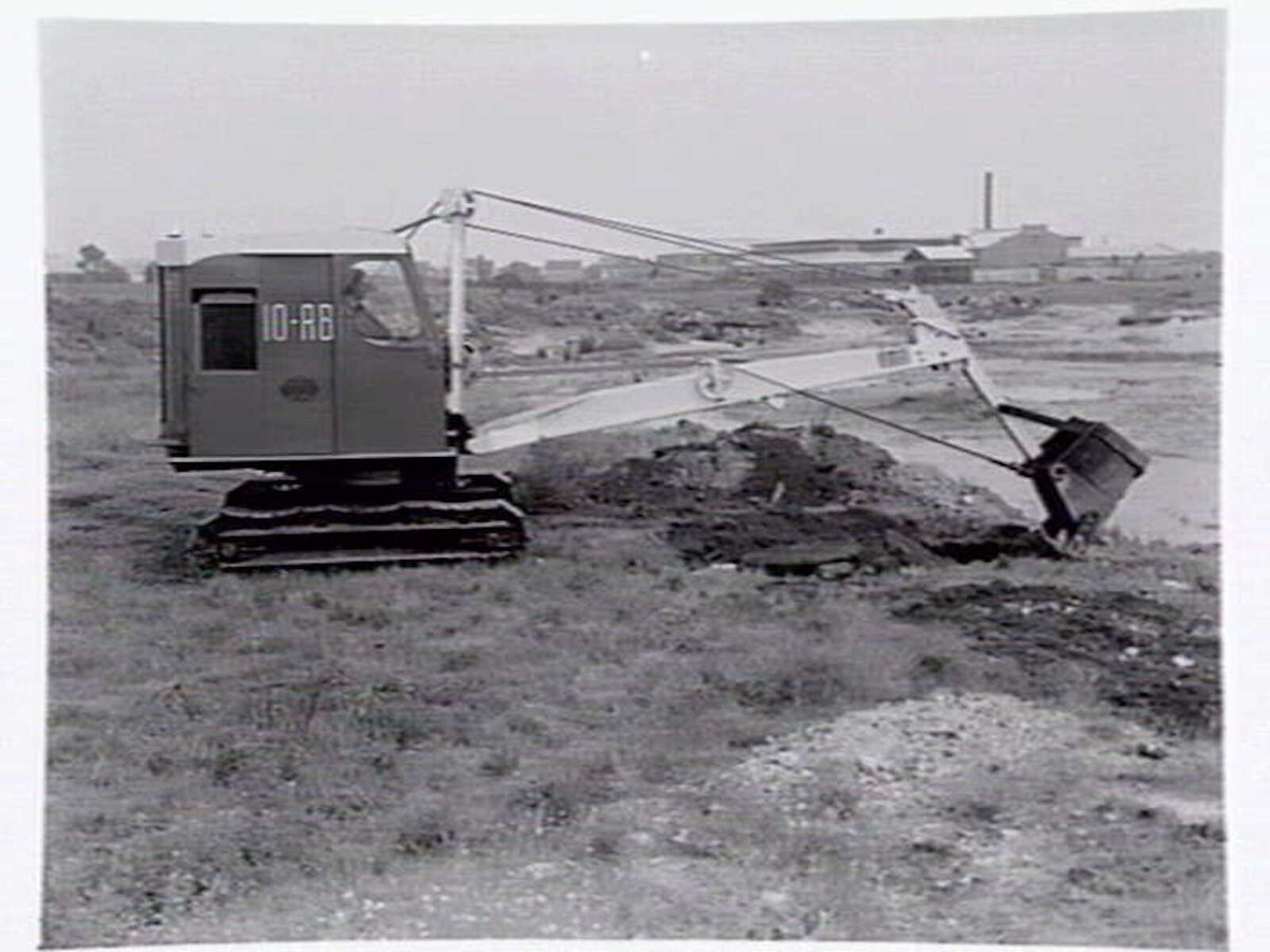 Ruston & Hornsby front end loader excavating a building site, Port Melbourne (1949)
