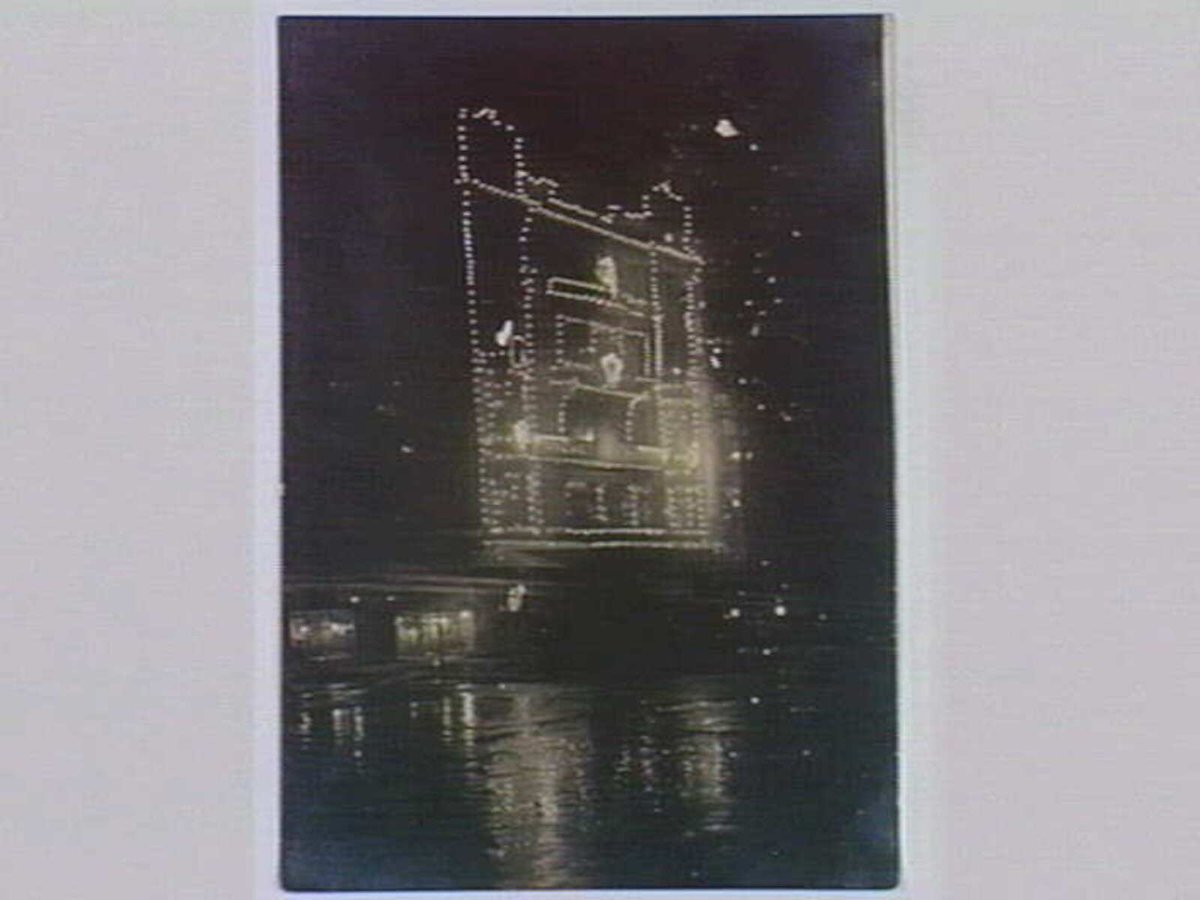 Anzac House, Melbourne, illuminated on a wet night, Melbourne City (1913–31)
