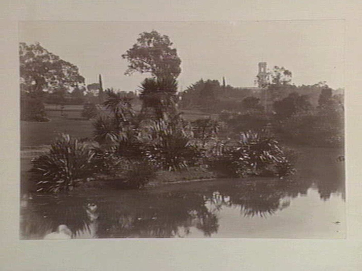 View of lake, Botanical Gardens, Melbourne. Government House is shown in the background, Melbourne City (c. 1890)