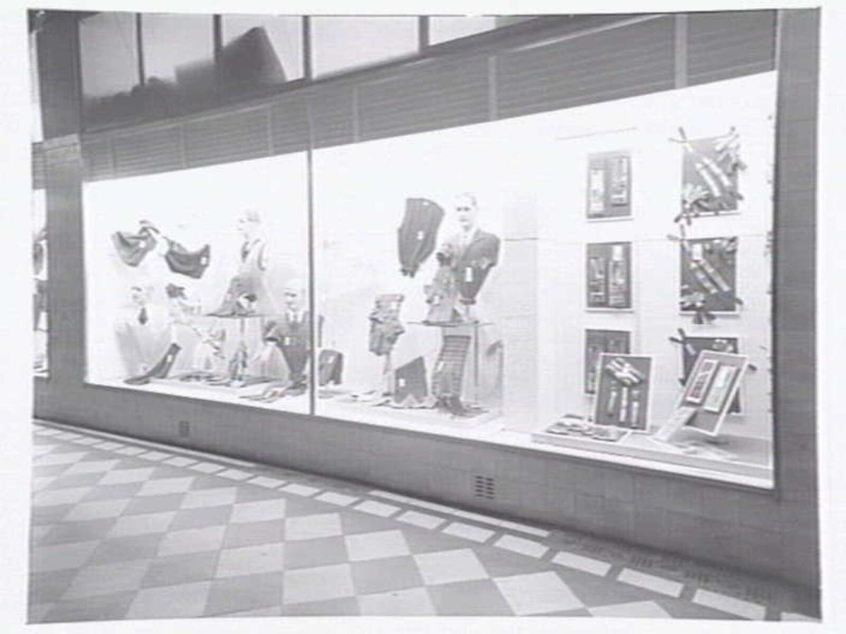 McLeod's Mens Store, corner Royal Arcade & Bourke St, window display and ground floor interior, Melbourne City (c. 1946)