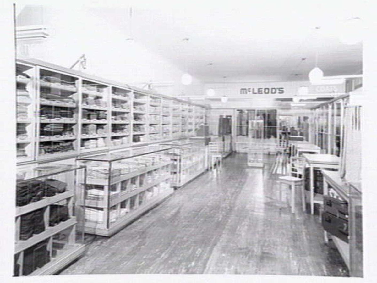 McLeod's Mens Store, corner Royal Arcade & Bourke St, window display and ground floor interior, Melbourne City (c. 1946)
