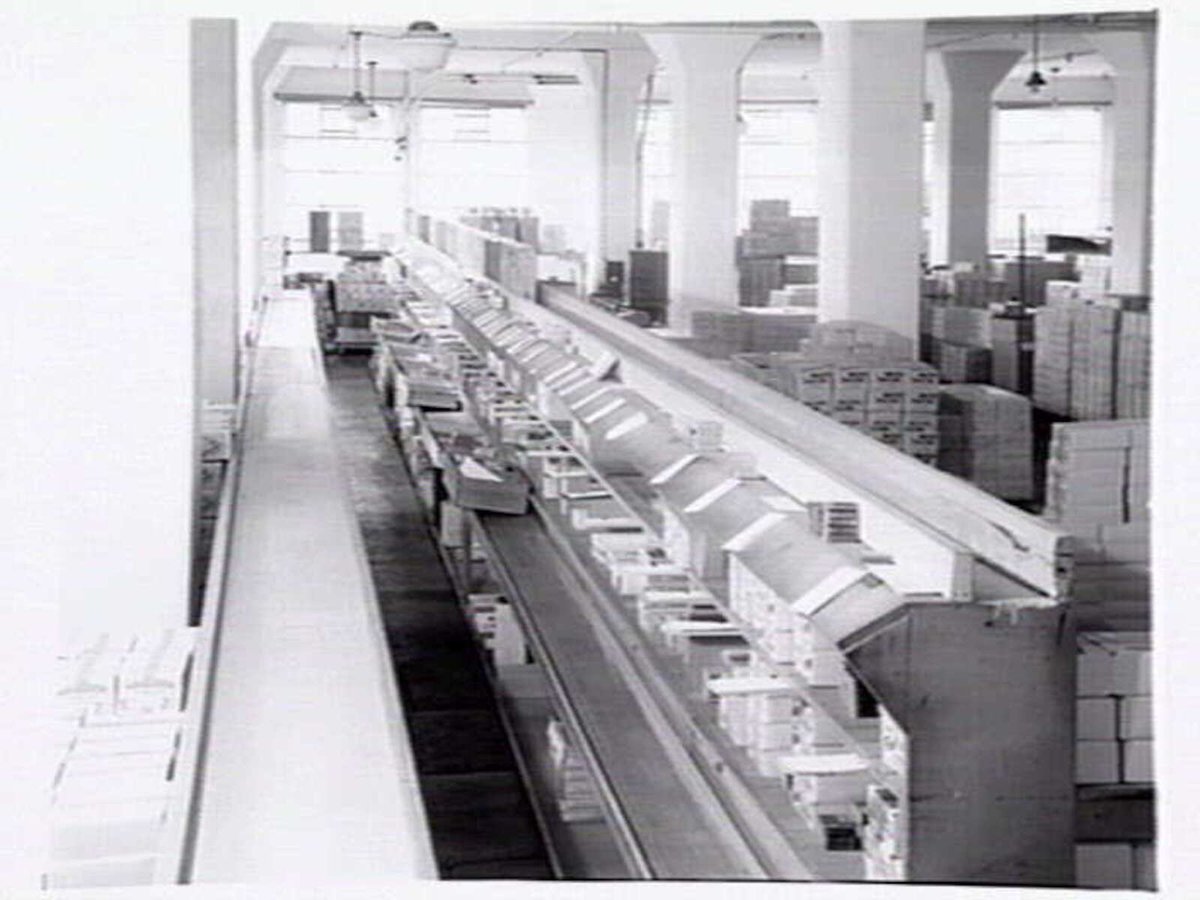 Cigarette production line at W.D. & H.O. Wills, 411-423 Swanston Street, Melbourne, Melbourne City (1947)