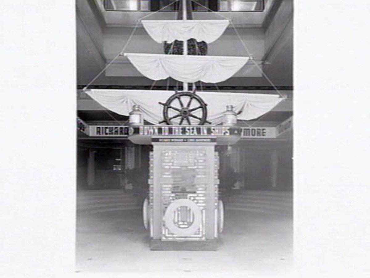 Decorations at the Capitol Theatre, Swanston St., Melbourne, for the film 'Down to the Sea in Ships', including posters or paintings and ships rigging at the ticket box, Melbourne City (1949)