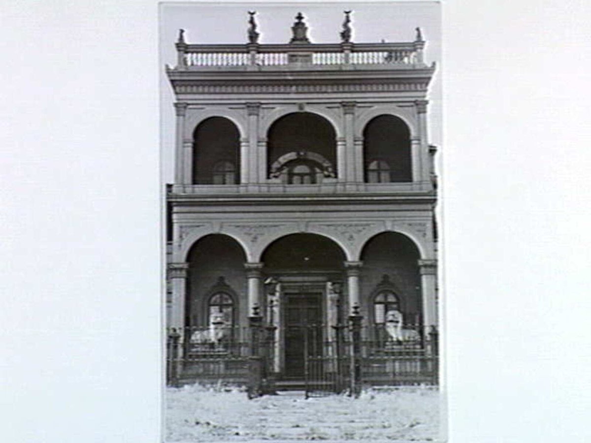 Chinese Joss House in Quiet [sic] [i.e. Raglan] street, South Melbourne, Vic. The gates are heavily barred & padlocked & secured (c. 1940)