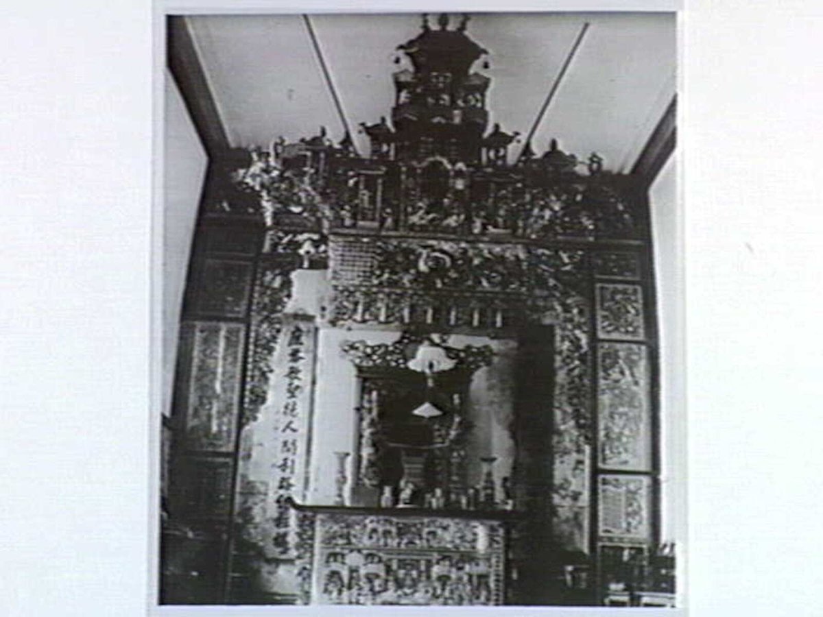 In Chinese Joss House, in Quiet [sic] [i.e. Raglan] Street, South Melbourne, Vic (c. 1940)