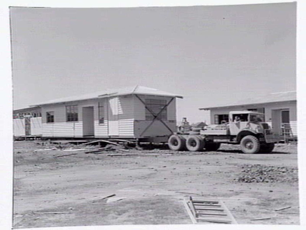 Pre-fabricated houses being moved on low loader in Highett and Mordialloc (c. 1952)