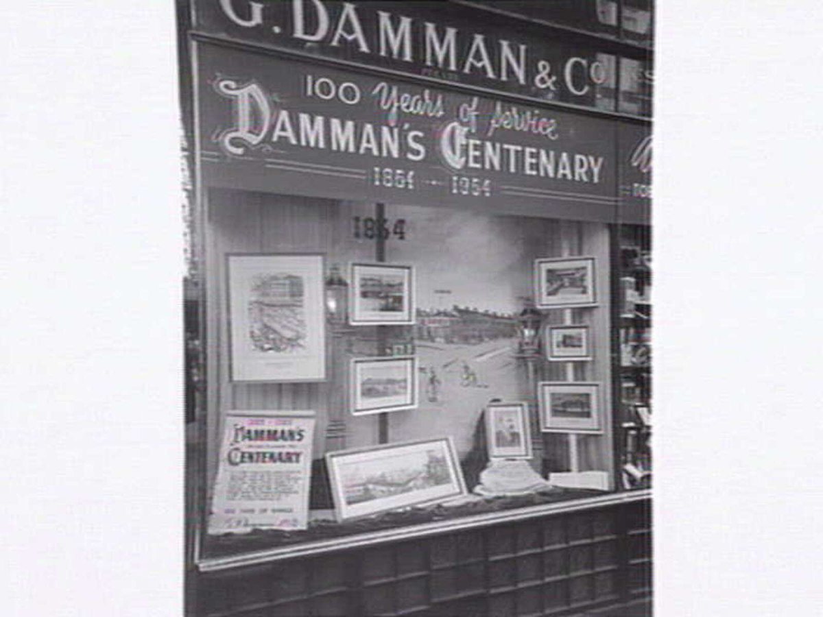 G. Damman & Co., Tobacconist, Cnr. Swanston & Collins Streets, Melbourne, Melbourne City (c. 1954)
