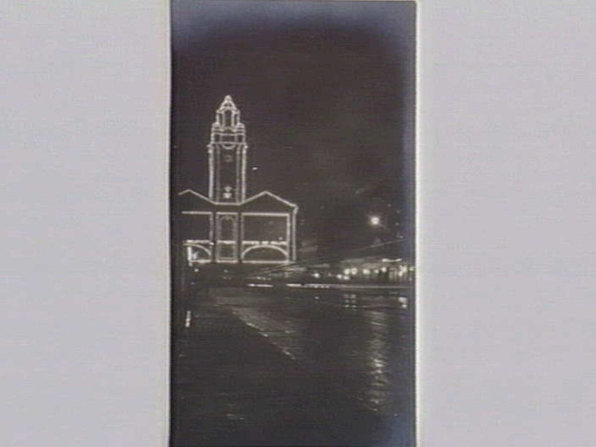 Flinders Street Station illuminated for visit of Prince of Wales, Melbourne City (1920)