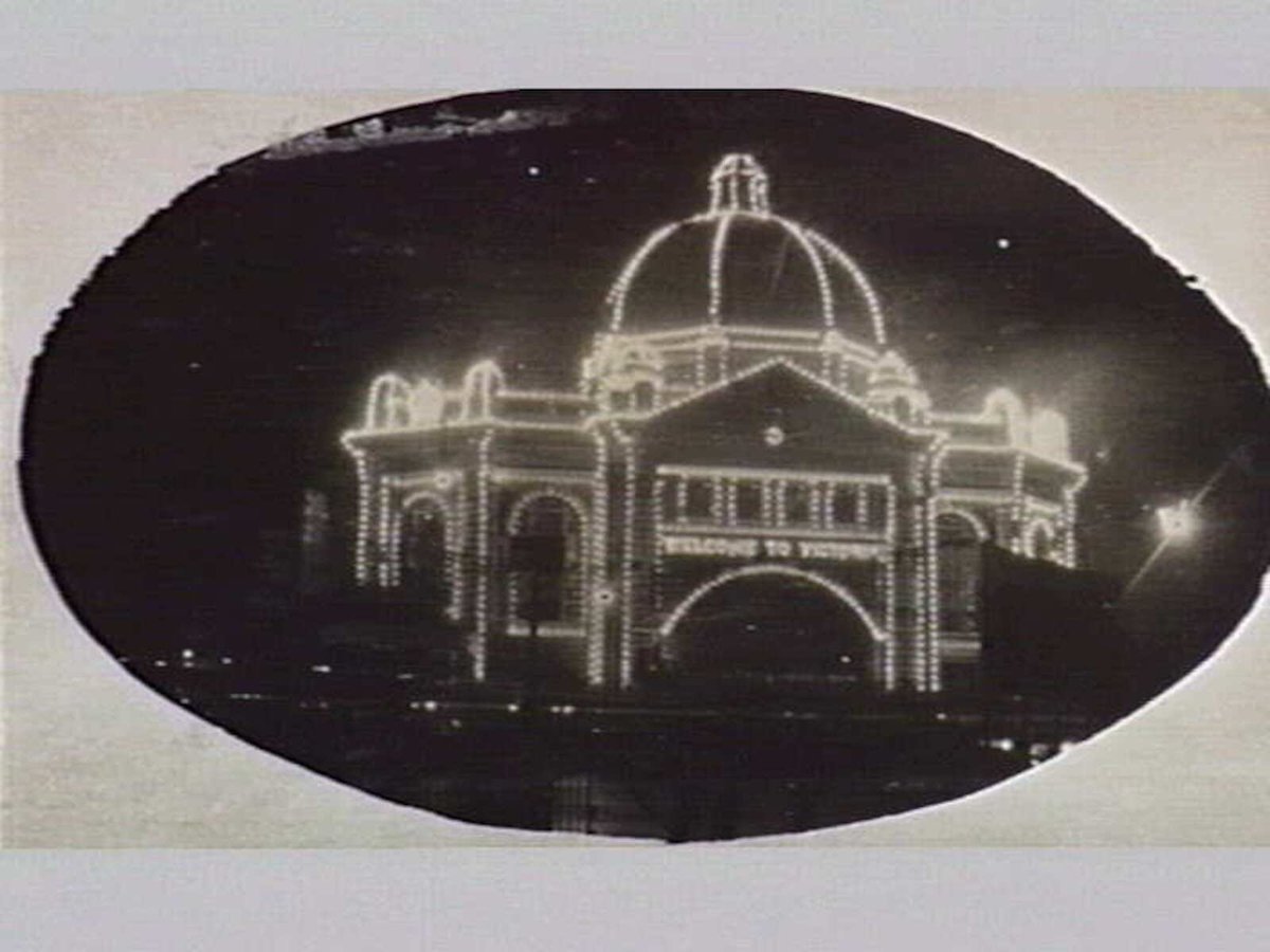 Flinders Street Station illuminated for visit of Prince of Wales, Melbourne City (1920)