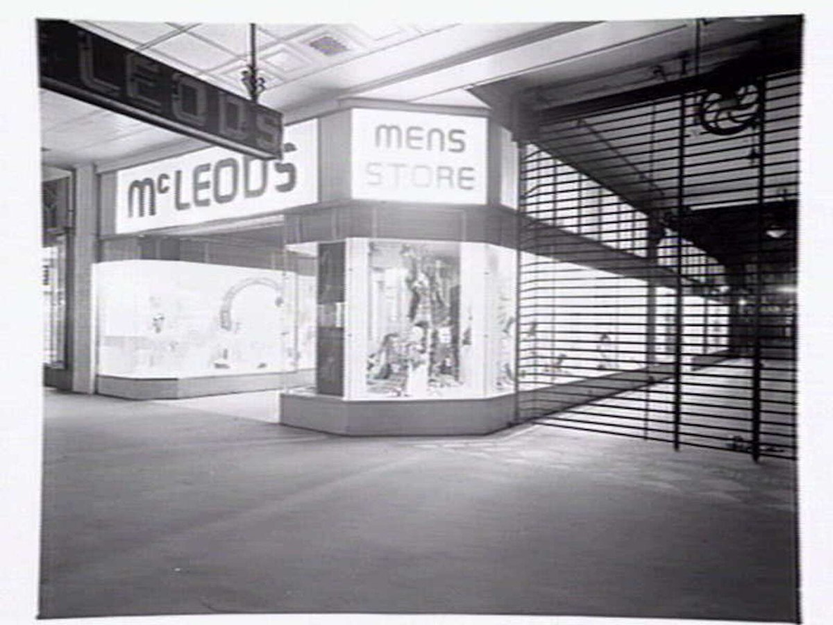 Window displays at McLeod's Mens Store, 335 Bourke Street, Melbourne, corner of Royal Arcade, Melbourne City (1946?)