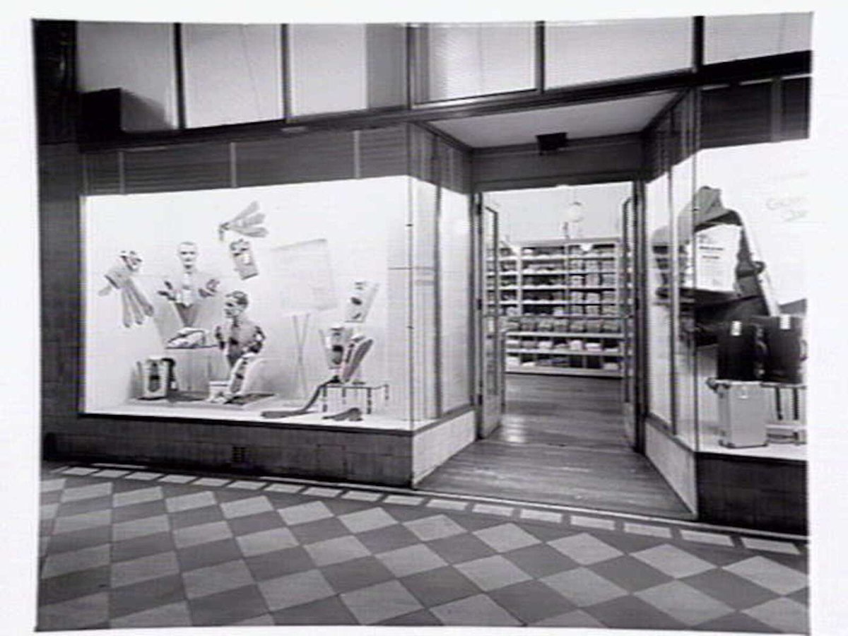 Window displays at McLeod's Mens Store, 335 Bourke Street, Melbourne, corner of Royal Arcade, Melbourne City (c. 1946)