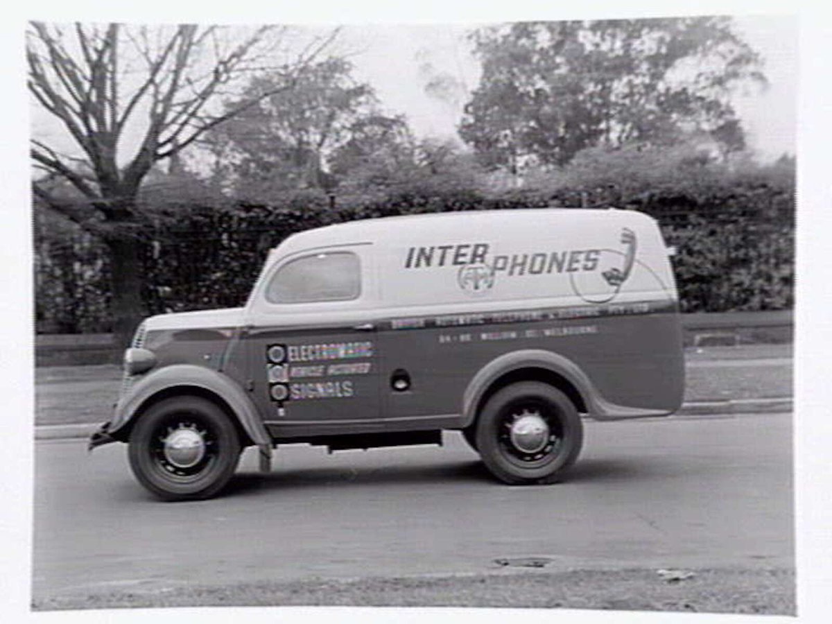 Van of British Automatic Telephone and Electric Pty. Ltd., 84-88 William Street, Melbourne, advertising Inter Phones ATM, Melbourne City (c. 1950)