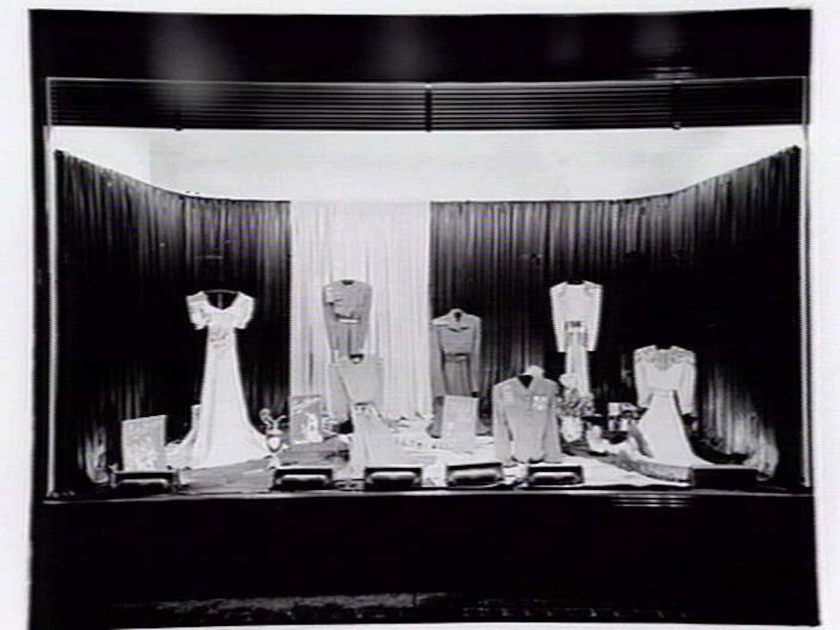 Lucy Secor Frock Salon, 280 Collins Street display window, taken during the day and at night, Melbourne City (c. 1941)