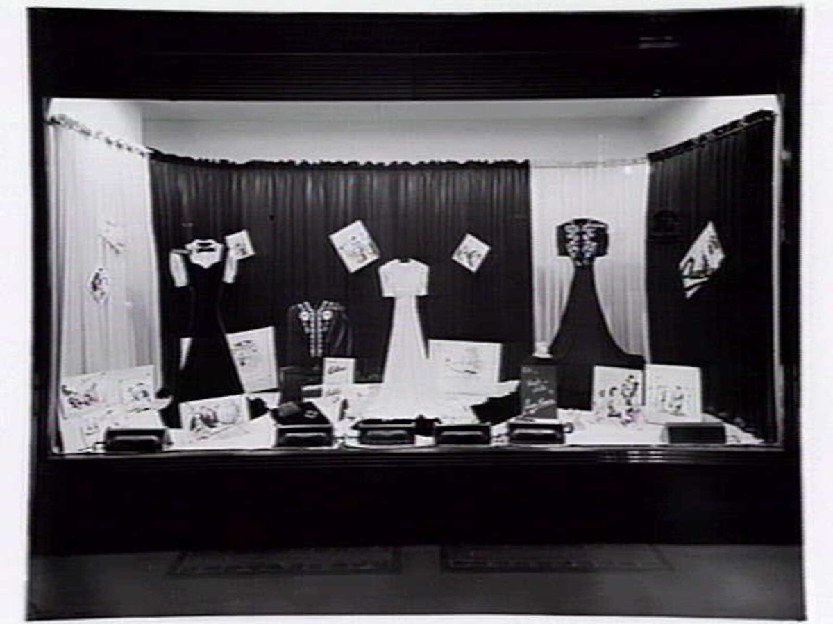 Lucy Secor Frock Salon, 280 Collins Street display window, taken during the day and at night, Melbourne City (1941?)
