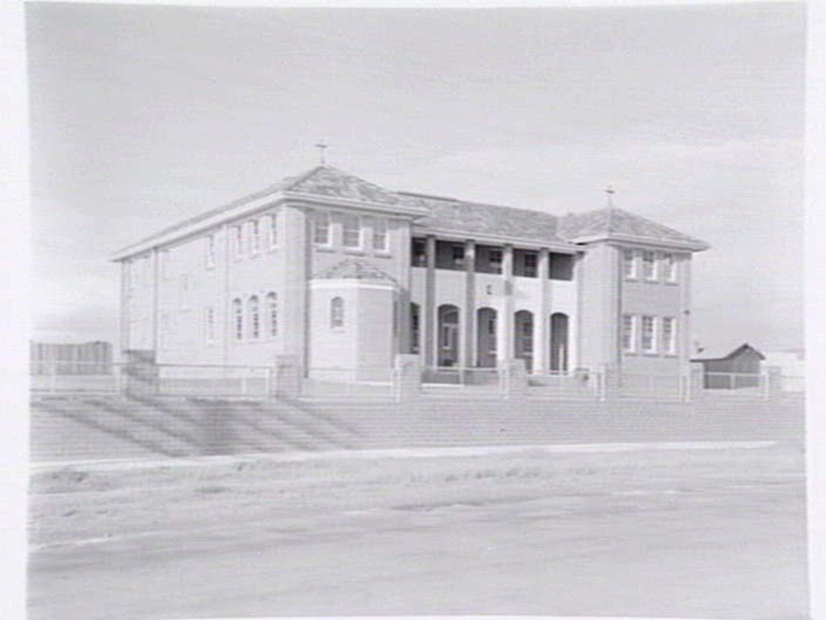 St. Vincent de Paul Girls' Orphanage, Napier St., South Melbourne, showing exterior views, girls in quadrangle and interiors of chapel, dining room and kitchen (c. 1940)