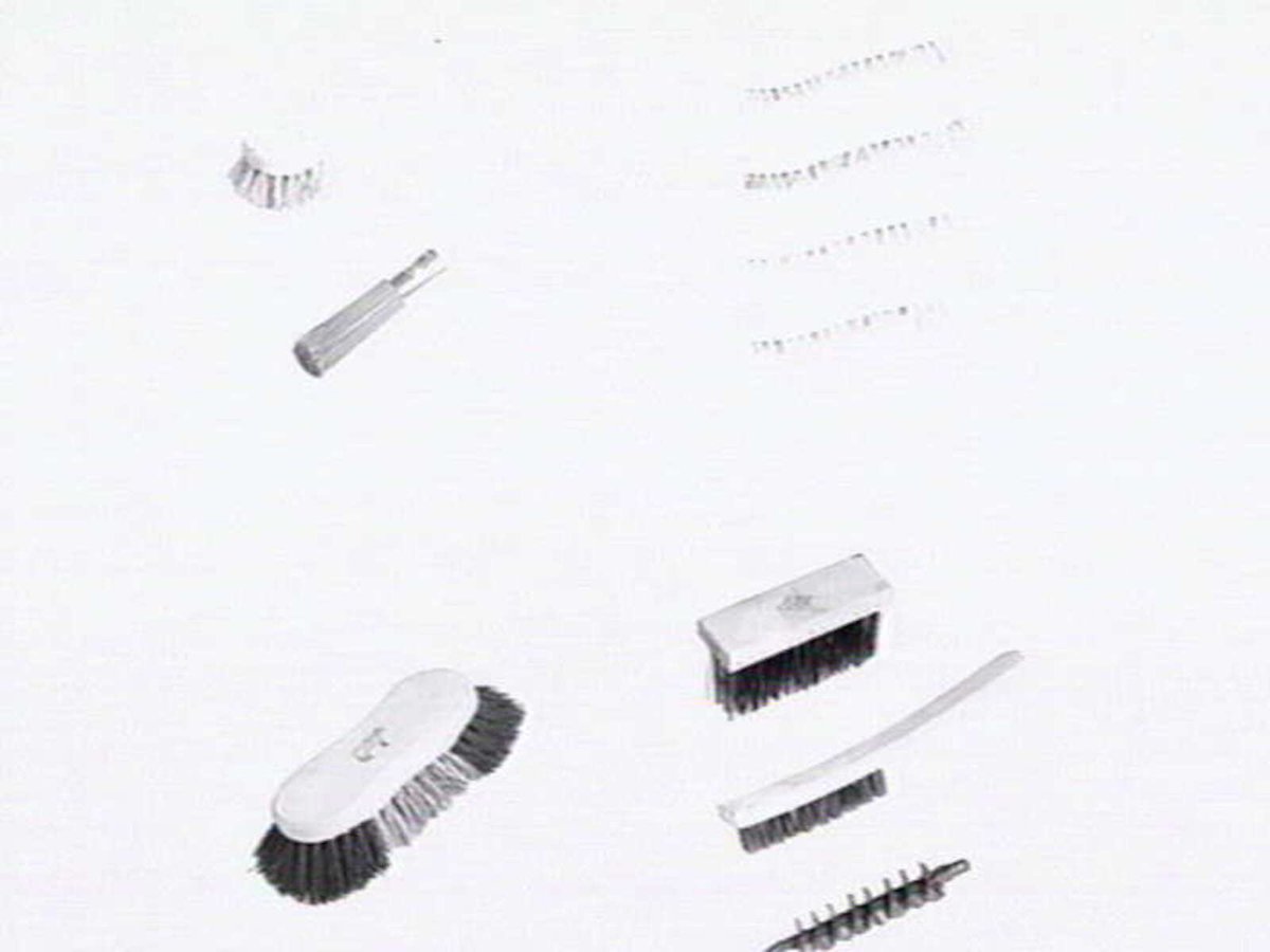 Thomas Mitchell & Son brushwear products, including broom heads, mops, straw brooms, paint brushes, feather dusters, scrubbing brushes and view of premises at 120-152 Victoria St., Brunswick (1952)