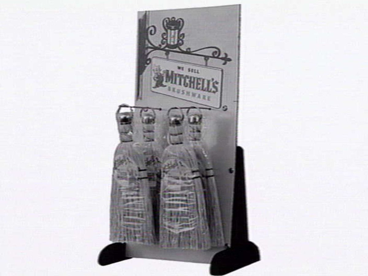 Thomas Mitchell & Son brushwear products, including broom heads, mops, straw brooms, paint brushes, feather dusters, scrubbing brushes and view of premises at 120-152 Victoria St., Brunswick (1952)