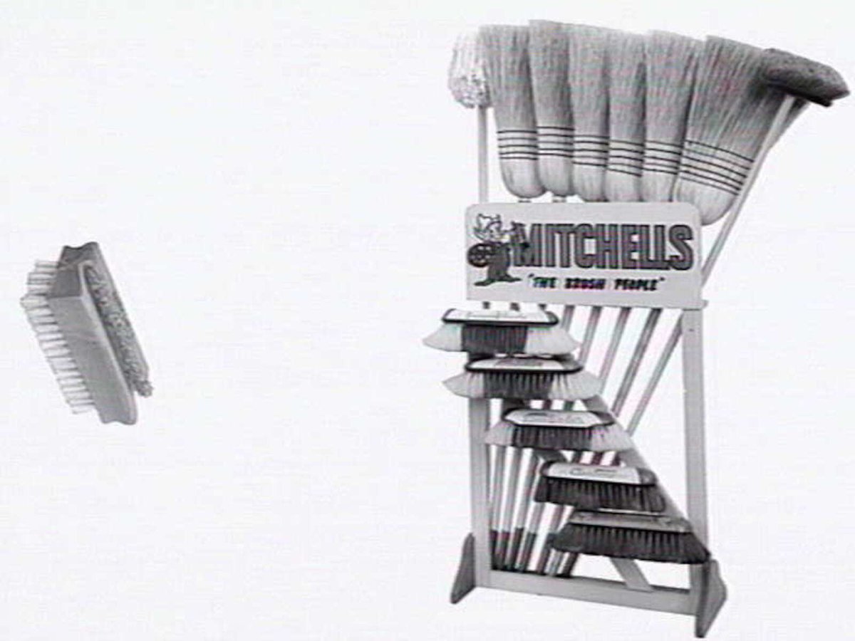 Thomas Mitchell & Son brushwear products, including broom heads, mops, straw brooms, paint brushes, feather dusters, scrubbing brushes and view of premises at 120-152 Victoria St., Brunswick (1952)