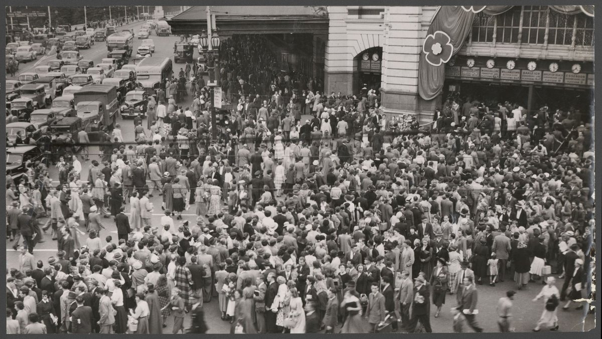 Large crowd of people at Flinders Street Railway Station, Melbourne, during tram strike, Melbourne City (1954)