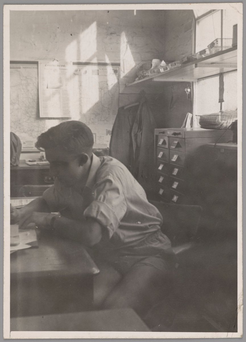 Young man at work, possibly in office of Thorne & Dean, Melbourne (1940s)