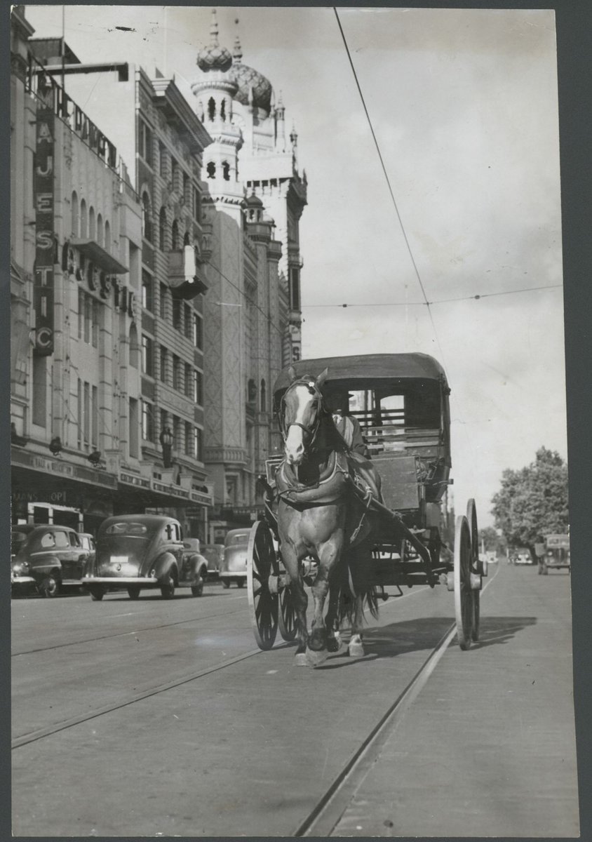 Horse and carriage on Flinders Street in tramless Melbourne, Melbourne City (1948)