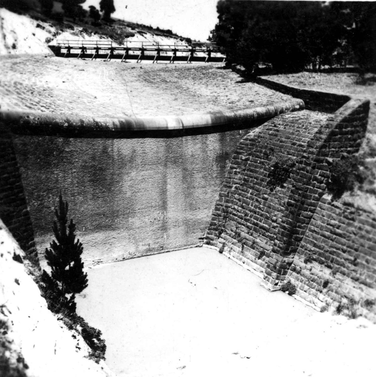 "Malmsbury Reservoir showing valve tower, by-wash, overfall, Ogee drop, outlet works and training wall" (1938?)
