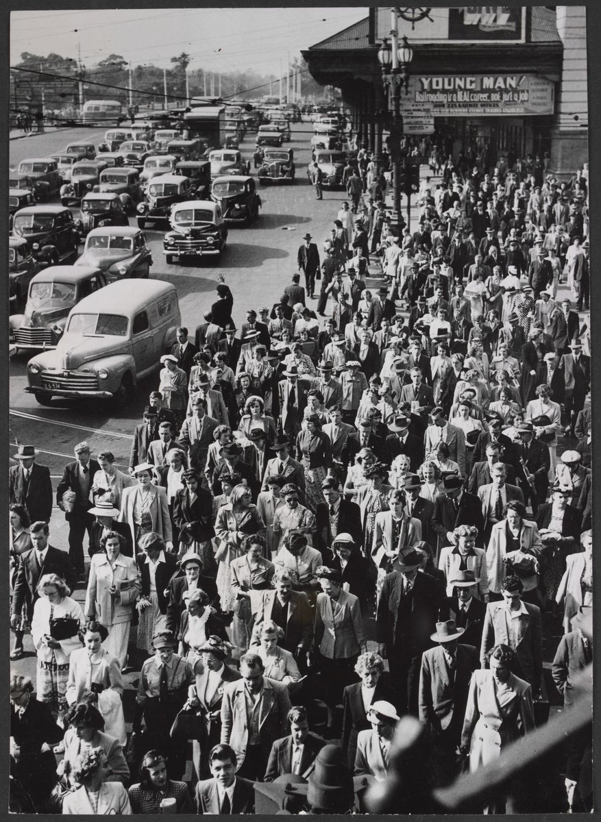 Large crowd of people on the corner of Flinders and Swanston Streets, Melbourne, during transport strike, Melbourne City (1950)