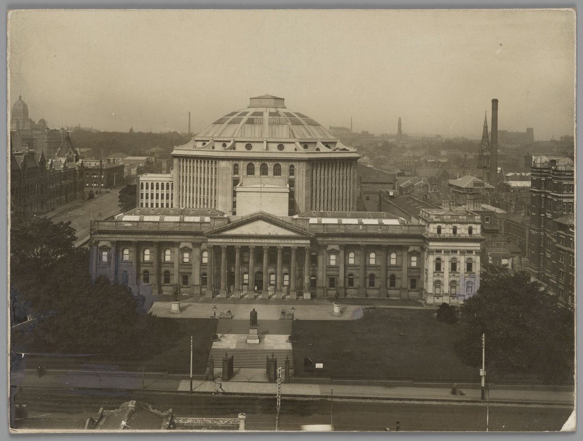 Elevated view of the State Library of Victoria, including the domed reading room, from across Swanston Street, Melbourne City (c. 1915)