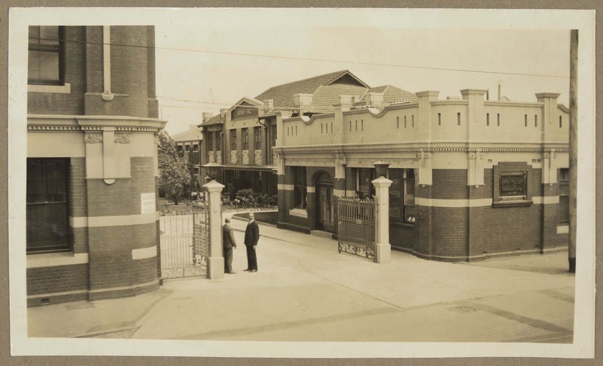 Looking through gates at Bryant & May, Richmond, to Brymay Hall (1928)