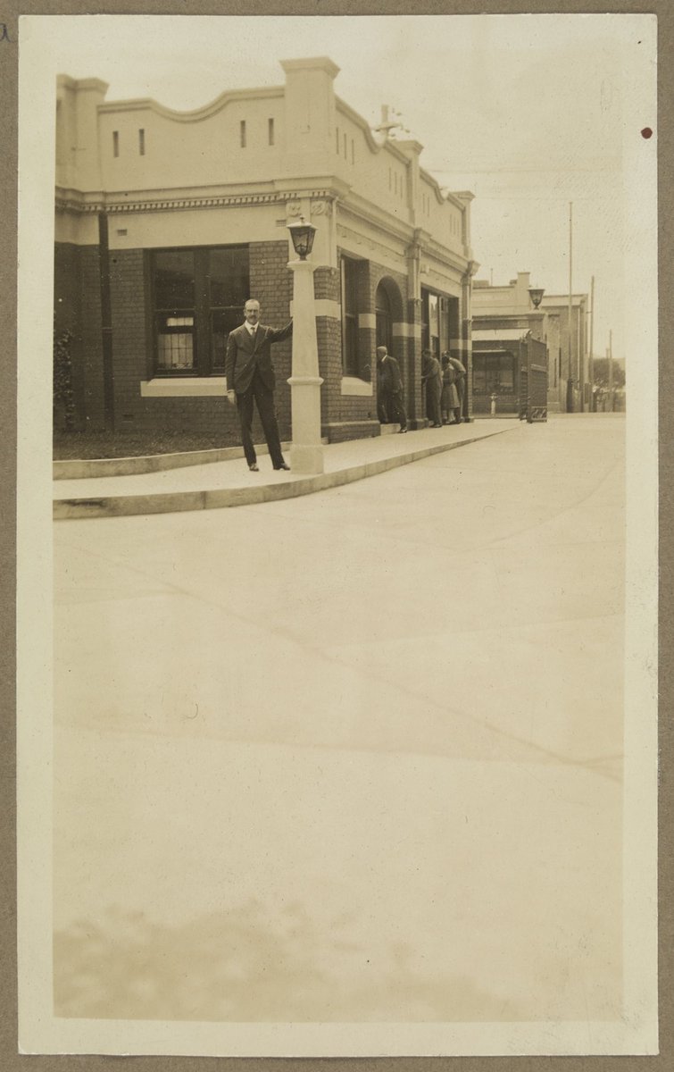 Mr. Joshua? standing inside grounds of Bryant & May factory, Richmond (1928)