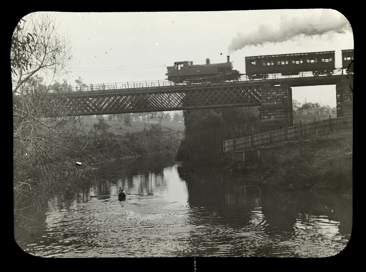 Steam train on railway bridge over the Yarra River, Victoria (1909)