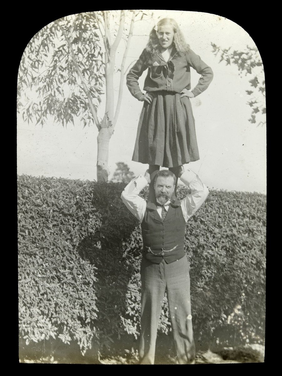 Girl standing on man's shoulders, possibly at Princes Court, St. Kilda, St Kilda (1909)