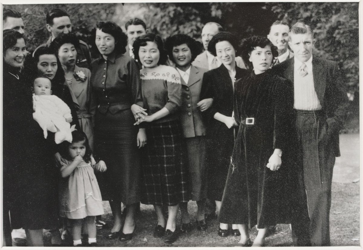 Japanese war brides and their husbands in the garden of Gordon Parker's parents' home. Ringwood 1953