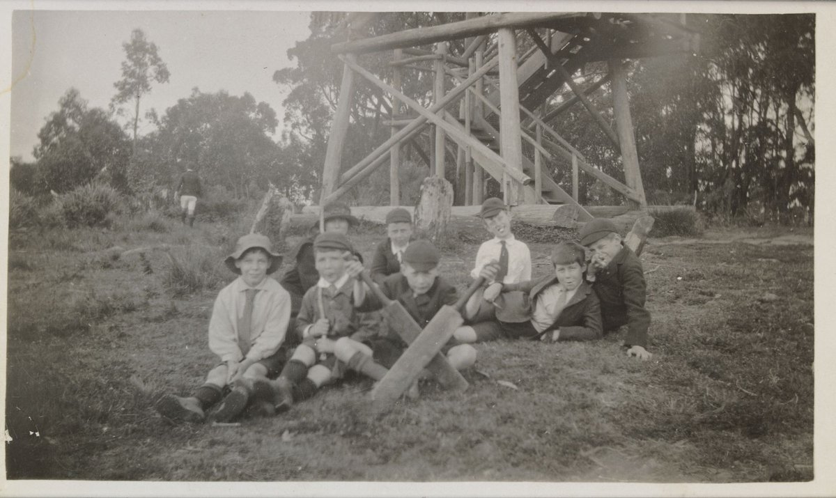 Boys taking a break from playing cricket, Melbourne (c. 1925)