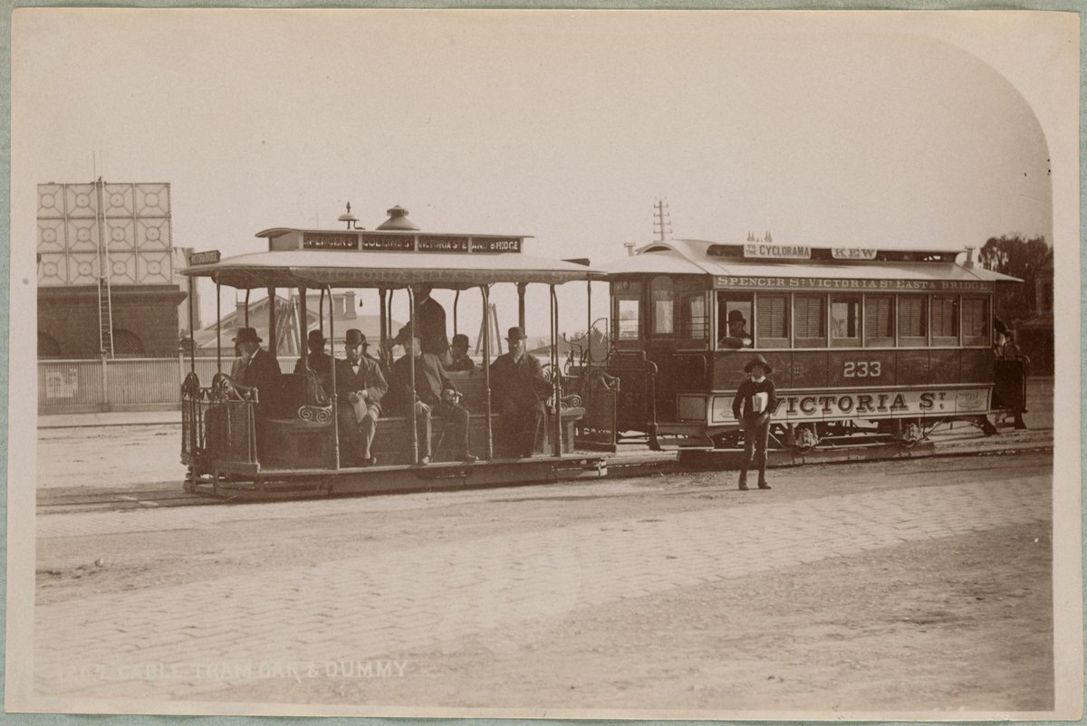 Cable tram car and dummy [in East Melbourne, with water tanks in the background] (1892–1900)