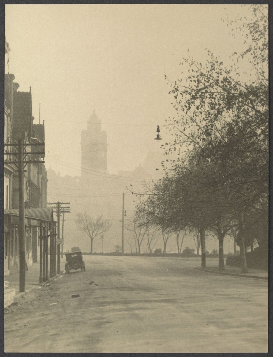 Looking across river towards Flinders St. Station, Melbourne City (c. 1922)