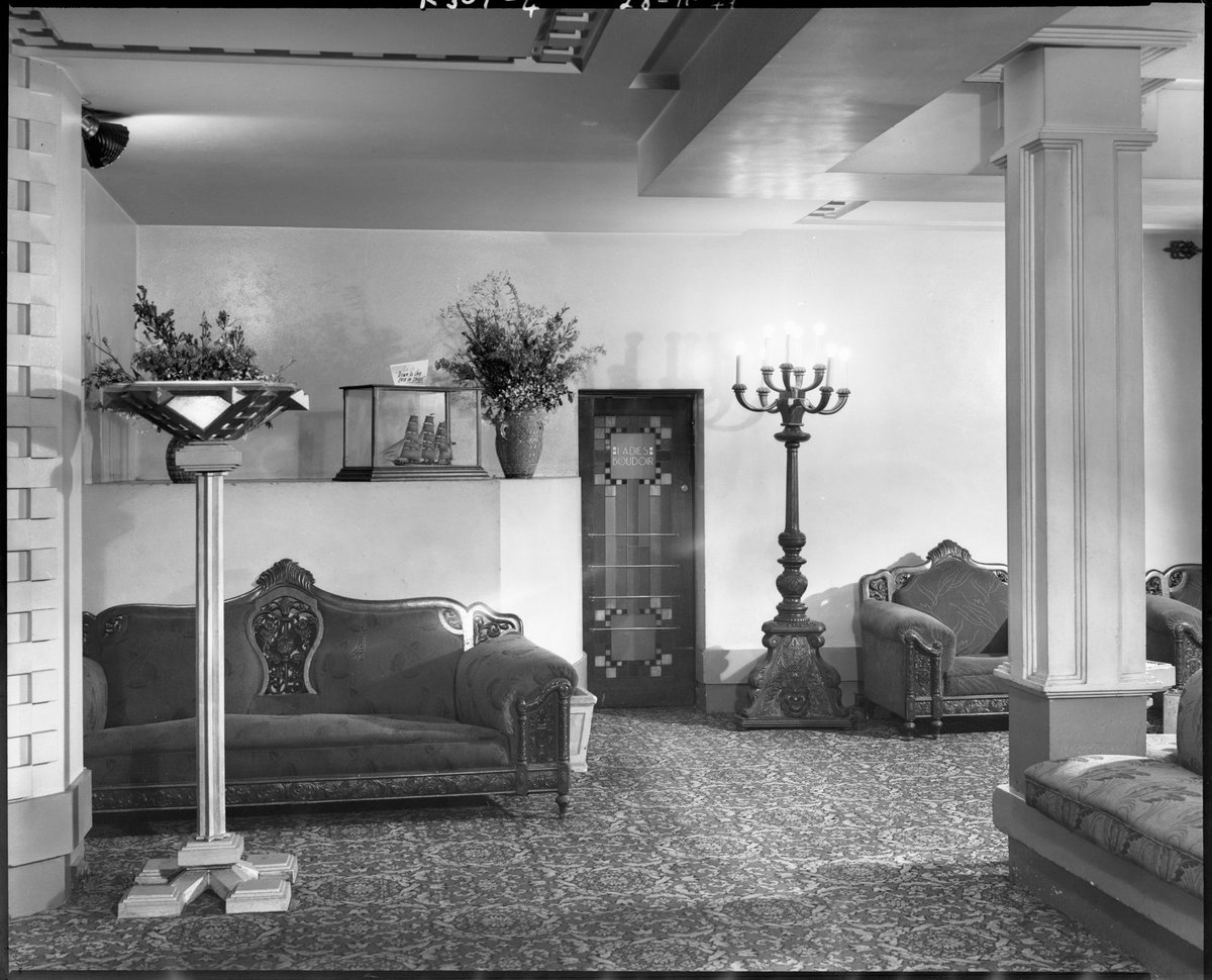 Leadlight door and lamp stand designed by Walter Burley Griffin in the Dress Circle foyer, Capitol Theatre, Swanston Street, Melbourne, Melbourne City (1949)
