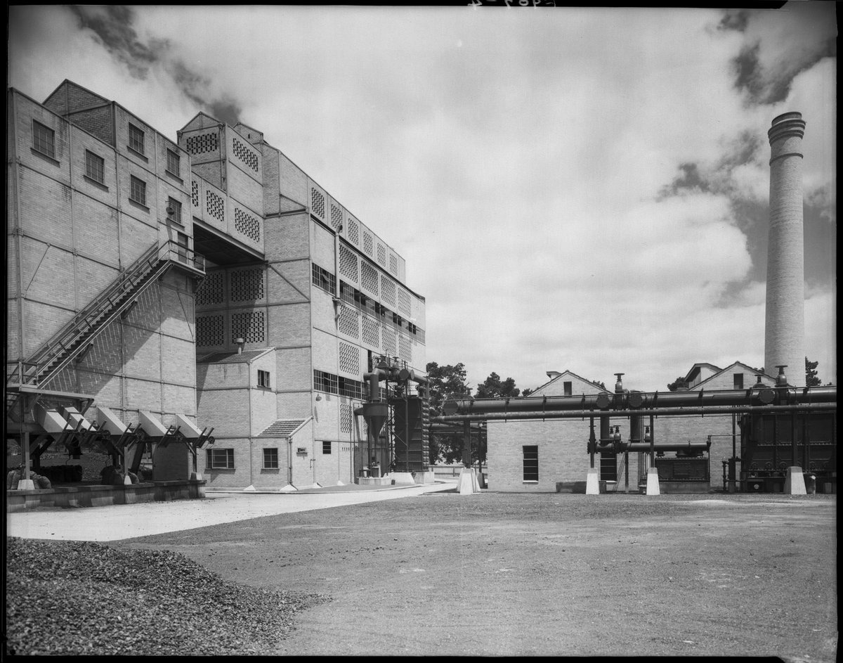 Exterior view of factory buildings and Chimney, Colonial Gas Association, Box Hill (c. 1945)