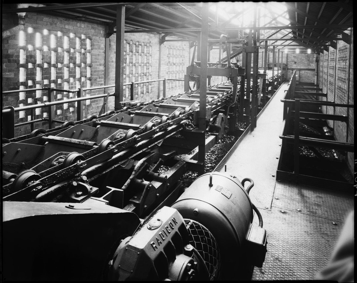 Interior view of conveyor system inside factory, Colonial Gas Association, Box Hill (c. 1945)