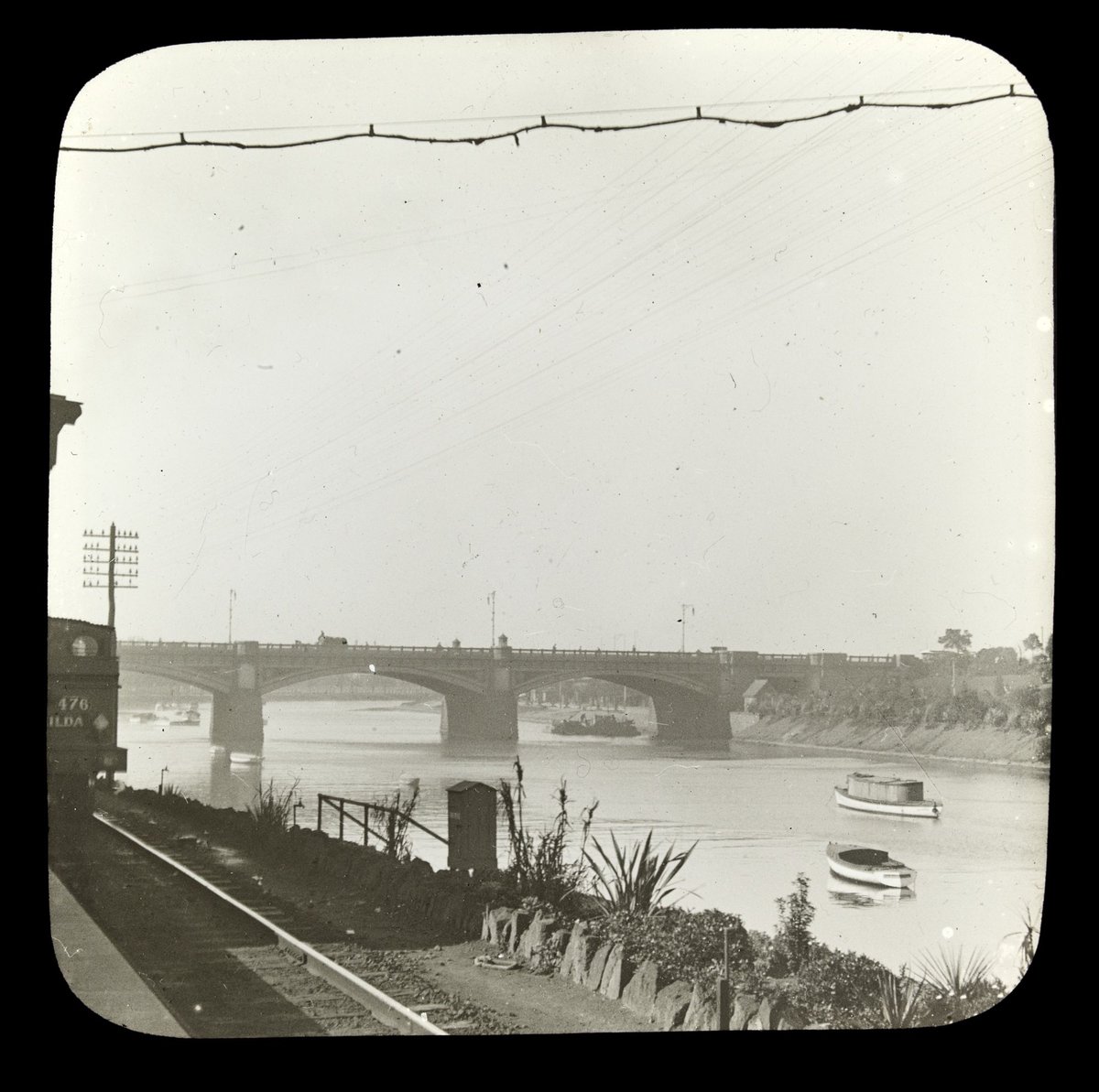 Princes Bridge viewed from railway line on north side of the Yarra River, Melbourne, Melbourne City (1909)