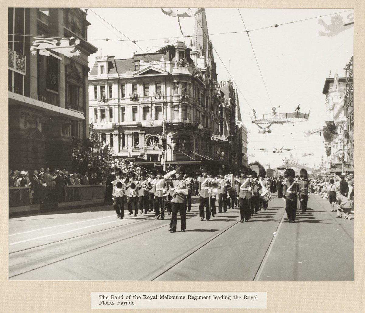 The Band of the Royal Melbourne Regiment leading the Royal Floats Parade (1954)