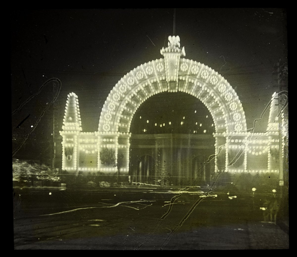 Decorated at night arch illuminated, Melbourne, for Royal Visit, Edward VII (1901)