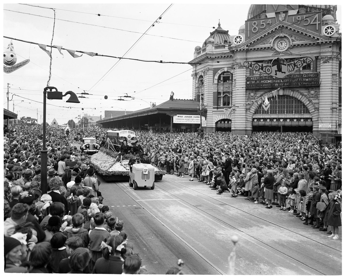 Moomba Festival VR float in procession past Flinders Street Station, Melbourne, Melbourne City (1954)