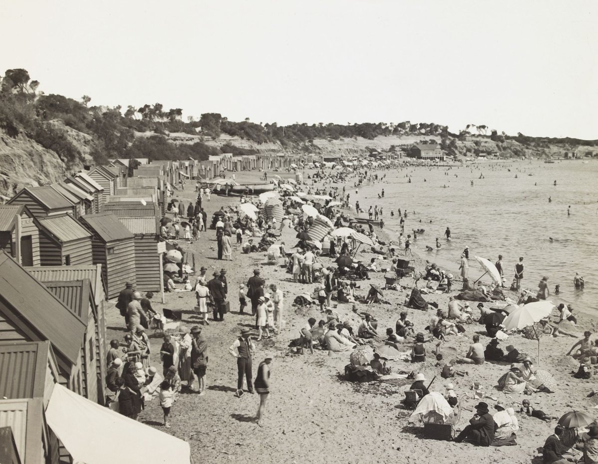 Crowds and bathing boxes on Hampton Beach (c. 1930)