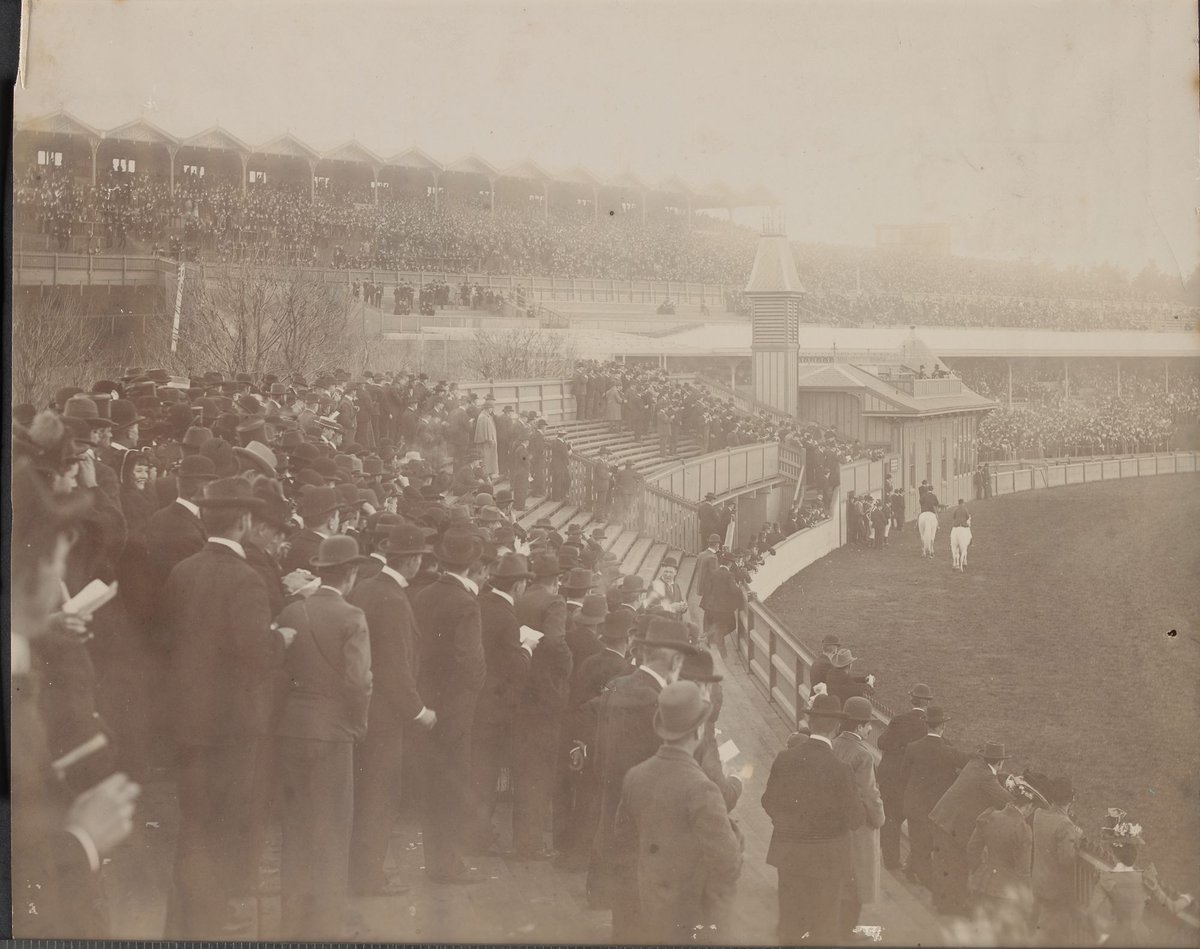Flemington race-course, view from stand, looking over the crowd to the other stands (c. 1890)
