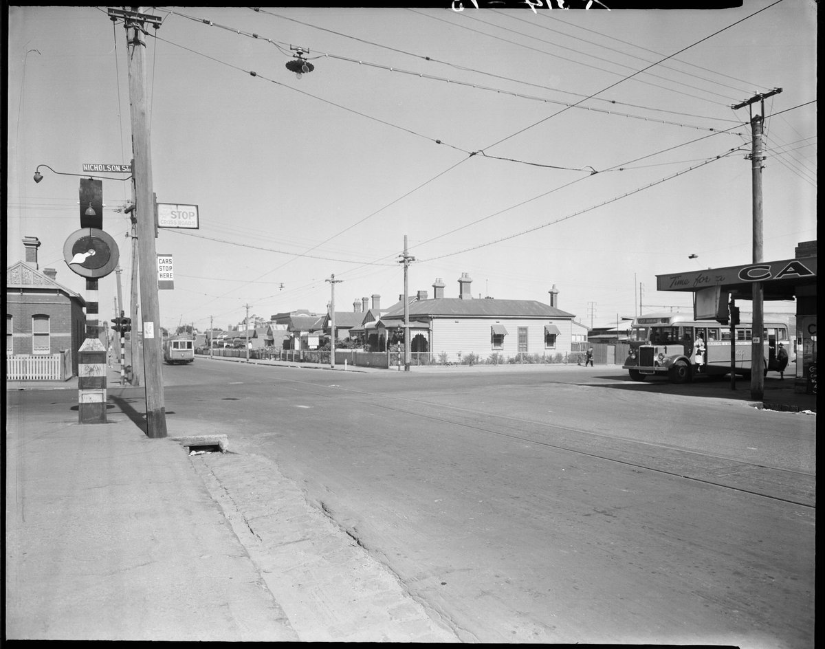 View east along Holden Street at Nicholson St. intersection, Fitzroy North (c. 1949)