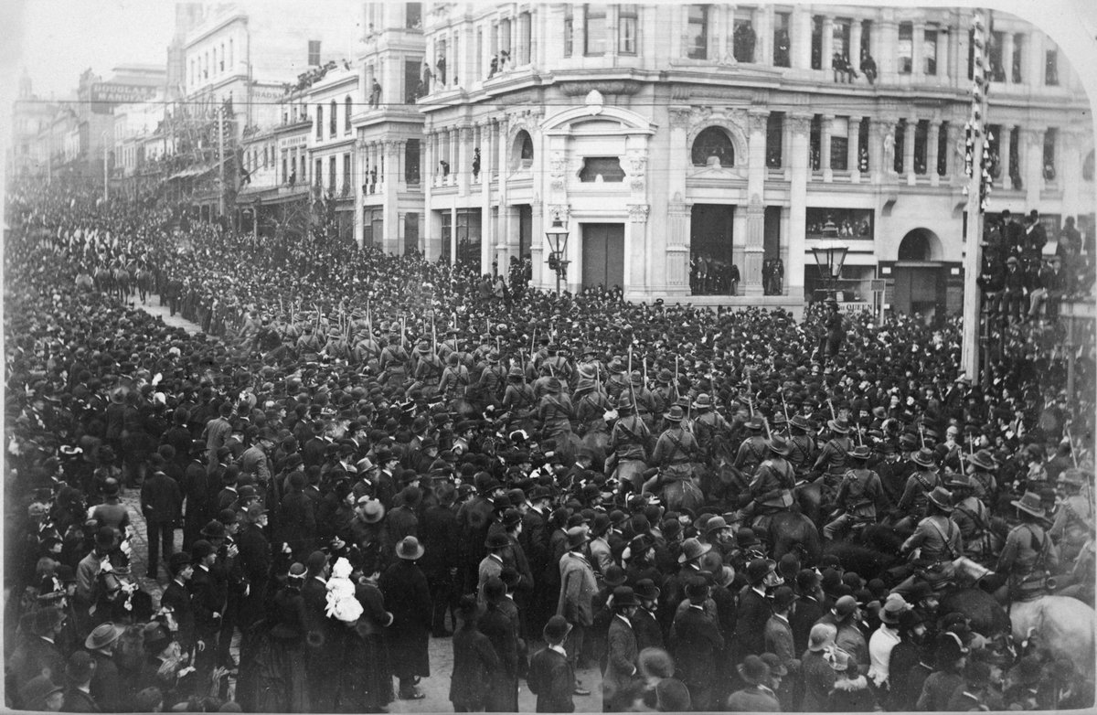 Centennial Exhibition Procession [looking south east from the corner of Collins & Swanston Streets], Melbourne City (1888)