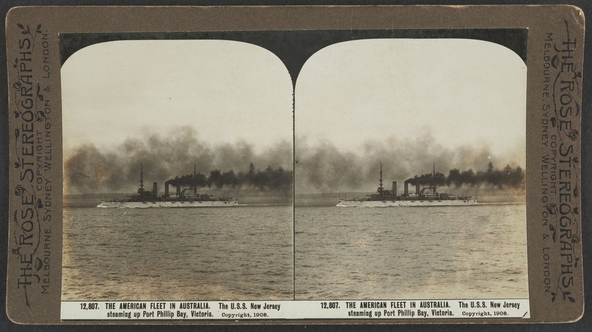 THE AMERICAN FLEET IN AUSTRALIA. The U.S.S. New Jersey steaming up Port Phillip Bay, Victoria (c. 1908)
